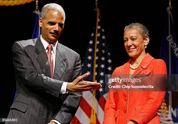 Attorney General Eric Holder acknowledges his wife Dr. Sharon Malone during his ceremonial installation at George Washington University March 27,...