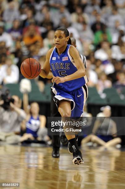 Jasmine Thomas of the Duke Blue Devils handles the ball against the Maryland Terrapins on March 8, 2009 in the ACC Championship game at the...