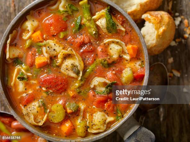 tortellini and vegetable soup - celery soup stock pictures, royalty-free photos & images
