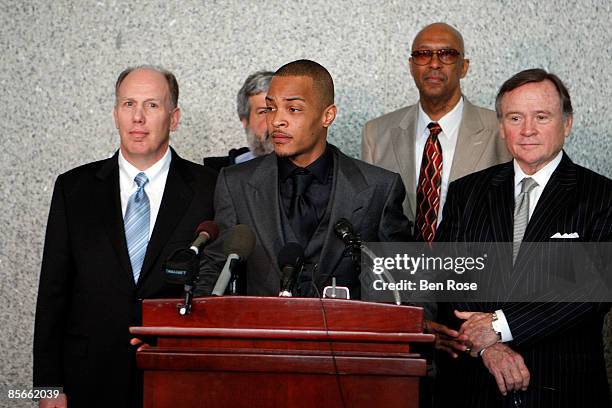 Clifford "T.I." Harris and members of his defense team appear at the Richard B. Russell Federal Building and United States Courthouse on March 27,...