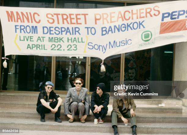 Welsh rock group Manic Street Preachers, Bangkok, Thailand, 27th April 1994. Left to right: drummer Sean Moore, bassist Nicky Wire, guitarist Richey...