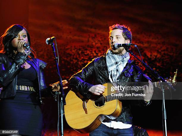 Keisha Buchanan of the Sugababes and James Morrison perform at Capital FM's Jingle Bell Ball held at the 02 Arena Docklands on December 10, 2008 in...