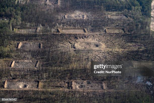 An aerial view shows the territory of a military base following recent massive explosions at ammunition depots in the Vynnytsya region, Ukraine...