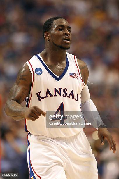 Sherron Collins of the Kansas Jayhawks reacts against the Dayton Flyers during the second round of the NCAA Division I Men's Basketball Tournament at...