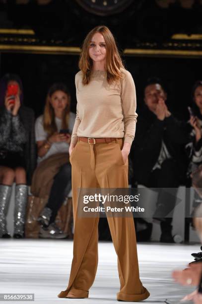 Desinger Stella McCartney acknowledges the audience at the end of her show as part of the Paris Fashion Week Womenswear Spring/Summer 2018 on October...
