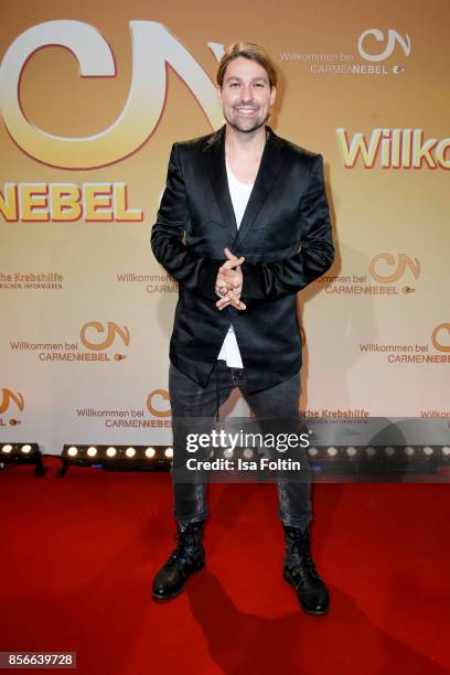 Violinist David Garrett during the tv show 'Willkommen bei Carmen Nebel' at TUI Arena on September 30, 2017 in Hanover, Germany.