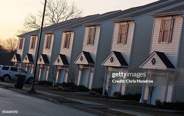 Car is parked, in front of a row house for military living on base, at Fort Hamilton, New York City's only active-duty military base, on March 27,...