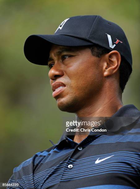Tiger Woods watches his drive on during the second round of the Arnold Palmer Invitational presented by MasterCard held at Bay Hill Club and Lodge on...