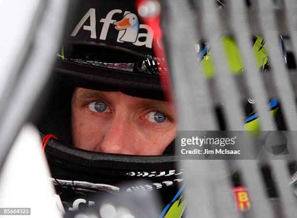 Carl Edwards, driver of the Aflac Ford, sits in his car during practice for the NASCAR Sprint Cup Series Goody�s Fast Pain Relief 500 at the...