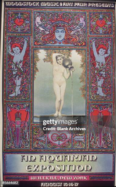 View of the original poster for the Woodstock Festival , 'An Aquarian Exposition,' 1969. The poster gives the event's original location of Wallkill,...