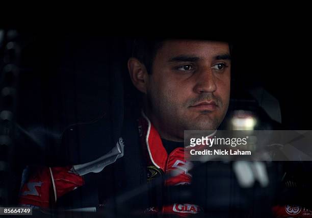 Juan Pablo Montoya, driver of the Target Toyota sits in his car during practice for the NASCAR Sprint Cup Series Goody�s Fast Pain Relief 500 at the...