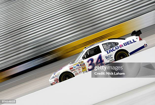 John Andretti, driver of the Taco Bell Chevrolet, drives during practice for the NASCAR Sprint Cup Series Goody�s Fast Pain Relief 500 at the...