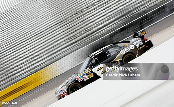 Aric Almirola, driver of the Guitar Hero Chevrolet drives during practice for the NASCAR Sprint Cup Series Goody�s Fast Pain Relief 500 at the...