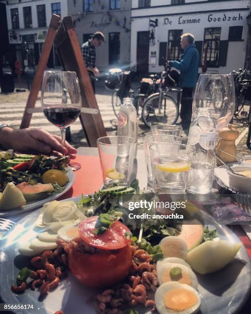healthy lunch outdoors in damme, belgium - damme stock pictures, royalty-free photos & images