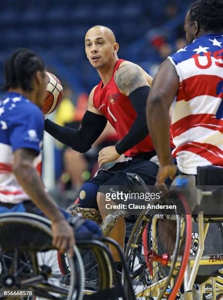 Maurice Manuel of Team Denmark looks to make a pass past heavy Team USA coverage in a semi-final game on Day Eight in Wheelchair Basketball during...