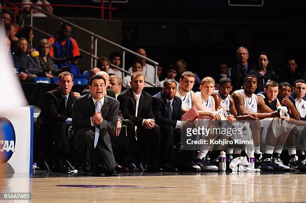 Playoffs: Xavier coach Sean Miller squatting on sidelines during game vs Wisconsin. Boise, ID 3/22/2009 CREDIT: Kohjiro Kinno