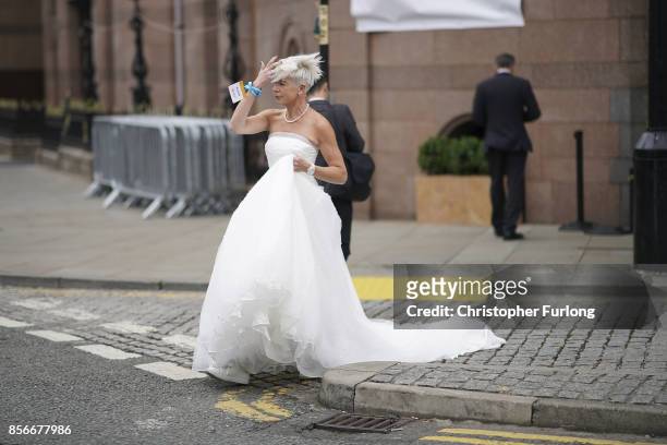 Columnist Katie Hopkins wears a wedding dress to promote a fringe event on day two of the Conservative Party Conference at Manchester Central on...