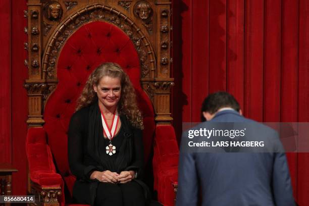 Canadian Prime Minister Justin Trudeau bowes to the new the Governor general Julie Payette at the senate in Ottawa, Ontario, October 2, 2017. The...
