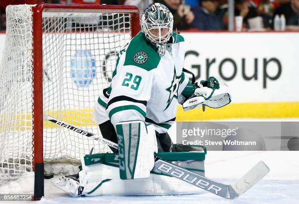 Goaltender Anders Lindback of the Dallas Stars warms up prior to a game against the Chicago Blackhawks at the United Center on January 4, 2015 in...