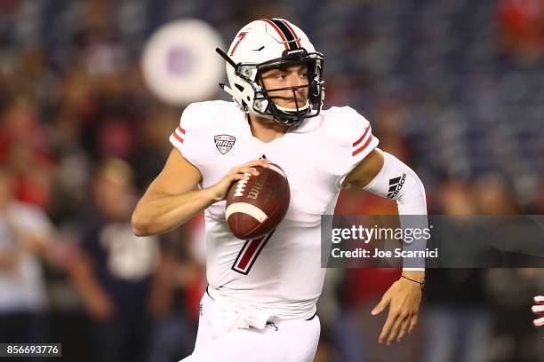 Daniel Santacaterina of the Northern Illinois Huskies runs with the ball in the second quarter during the Northern Illinois v San Diego State game at...