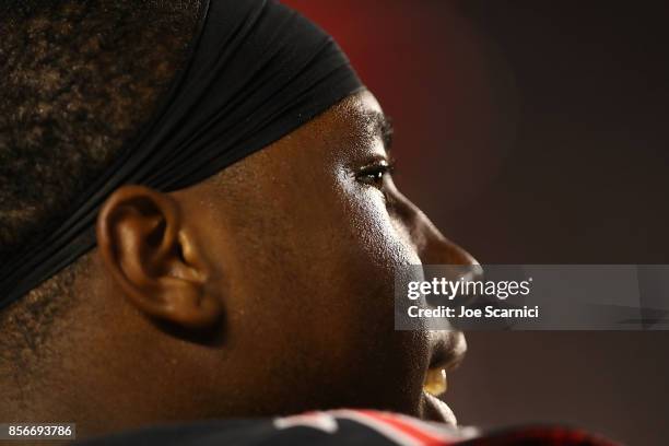 Juwan Washington of the San Diego State Aztecs looks on from the bench during the Northern Illinois v San Diego State game at Qualcomm Stadium on...