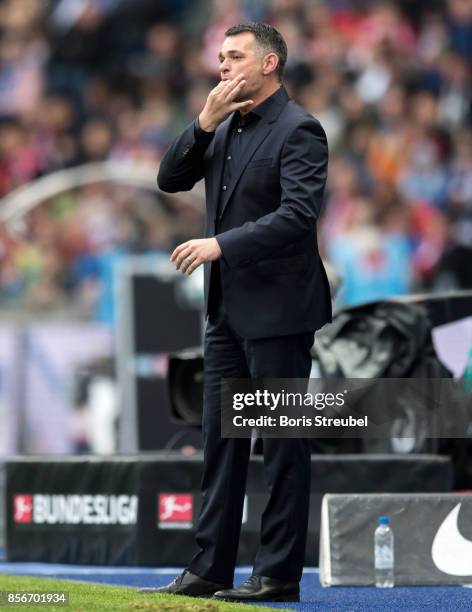 Head coach Willy Sagnol of FC Bayern Muenchen gestures during the Bundesliga match between Hertha BSC and FC Bayern Muenchen at Olympiastadion on...