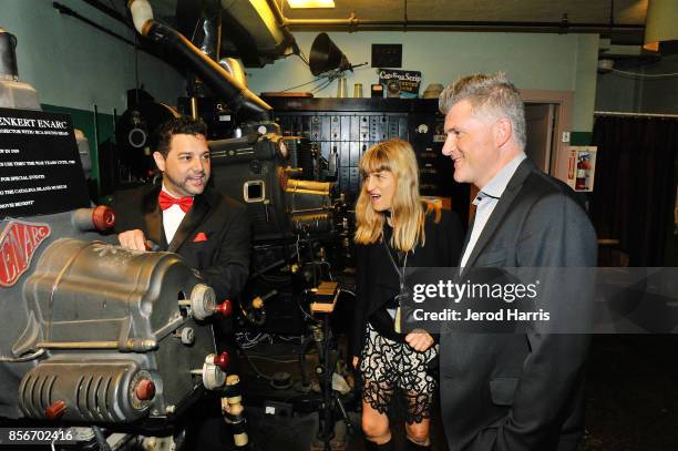Catalina Film Festival founder Ron Truppa, Catherine Hardwicke and Jamie Marshall tour the projection room in the Avalon Theater at the 2017 Catalina...