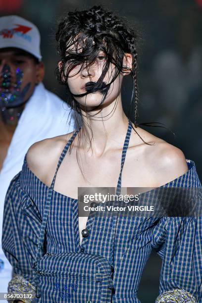 Model walks the runway during the Vivienne Westwood Ready to Wear Spring/Summer 2018 fashion show as part of Paris Fashion Week at on September 30,...