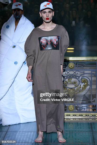 Model walks the runway during the Vivienne Westwood Ready to Wear Spring/Summer 2018 fashion show as part of Paris Fashion Week at on September 30,...