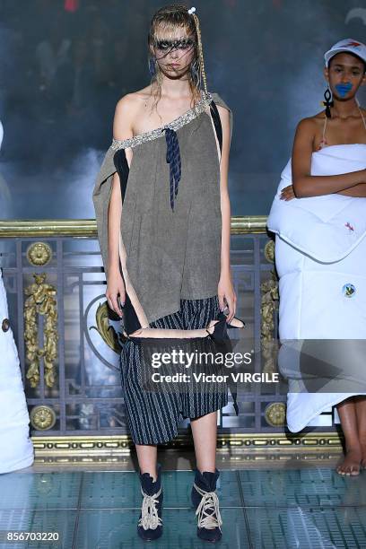 Model walks the runway during the Vivienne Westwood Ready to Wear Spring/Summer 2018 fashion show as part of Paris Fashion Week at on September 30,...