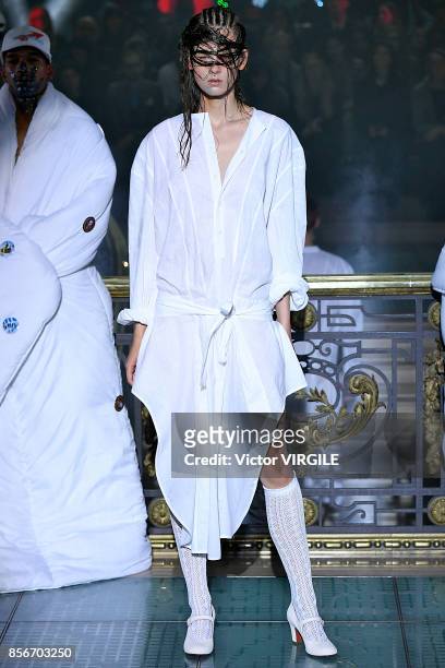 Model walks the runway during the Vivienne Westwood Ready to Wear Spring/Summer 2018 fashion show as part of Paris Fashion Week at on September 30,...