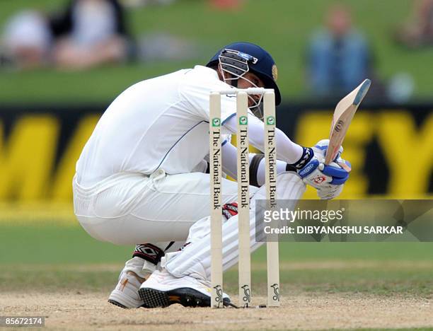 Indian cricketer Rahul Dravid ducks a ball during the third day of the second Test match at the McLean Park in Napier on March 28, 2009. In reply to...