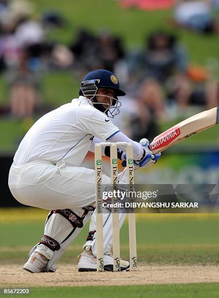 Indian cricketer Rahul Dravid ducks a ball during the third day of the second Test match at the McLean Park in Napier on March 28, 2009. In reply to...