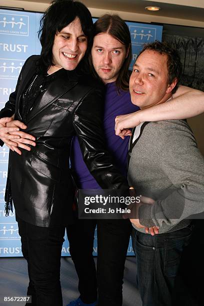 Tom Meighan of Kasabian , comedian Noel Fielding and actor Stephen Graham pose backstage after the fourth night of a series of concerts and events in...