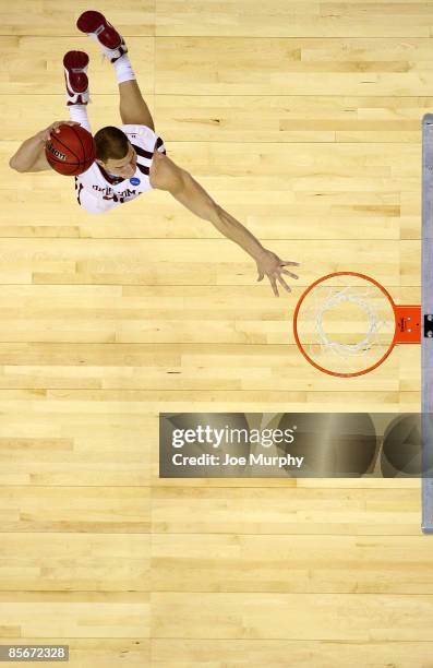 Blake Griffin of the Oklahoma Sooners dunks the ball in the second half against the Syracuse Orange during the NCAA Men's Basketball Tournament South...