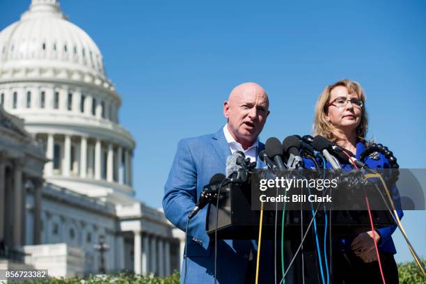 Former Congresswoman Gabrielle Giffords, D-Ariz., and her husband retired NASA astronaut Captain Mark Kelly hold a news conference at the U.S....