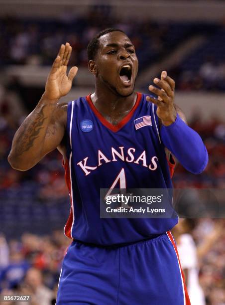 Sherron Collins of the Kansas Jayhawks reacts in the first half against the Michigan State Spartans during the third round of the NCAA Division I...