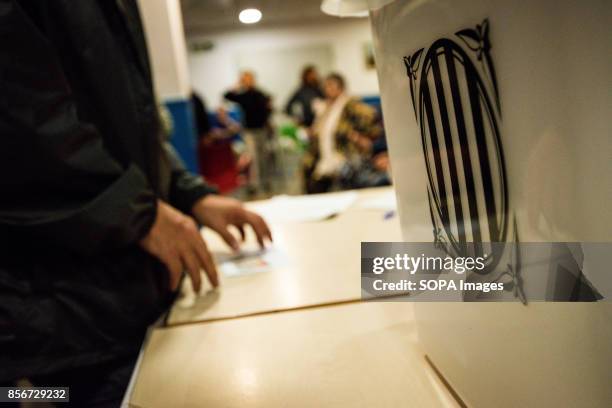 Urn at a polling station. More than five million eligible Catalan voters are estimated to visit 2,315 polling stations today for Catalonia's...