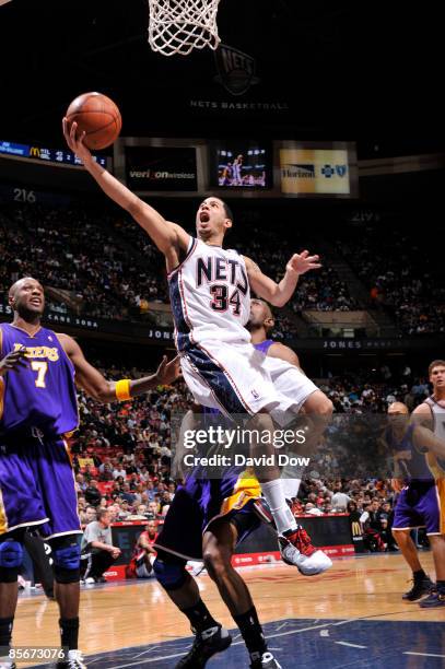 Devin Harris of the New Jersey Nets shoots against the Los Angeles Lakers during the game on March 27, 2009 at the Izod Center in East Rutherford,...