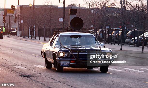 Dan Aykroyd arrives at Chicago Blackhawks game in the Blackhawks Mobile Car, a 1974 Dodge Monaco from the movie 1980 "The Blues Brothers" March 27,...