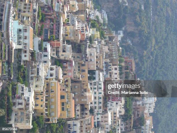 view of building built along cliffside - cliffside home stock pictures, royalty-free photos & images