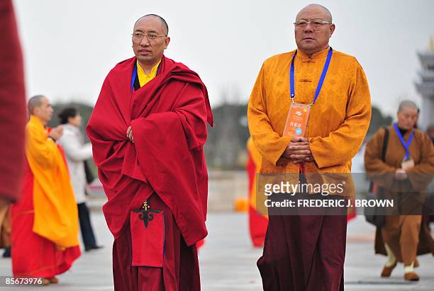 Tibetan Buddhist monks arrive for the opening session of the World Buddhist Forum on March 28, 2009 in Wuxi, in eastern China's Jiangsu province,...