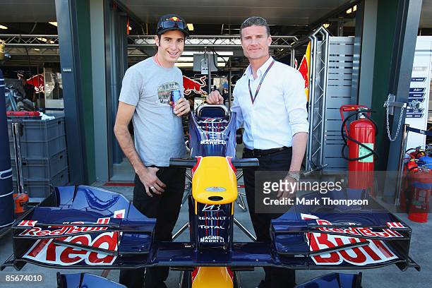Former F1 driver David Coulthard shows V8 Supercar driver Rick Kelly around the Red Bull Racing garage before qualifying for the Australian Formula...