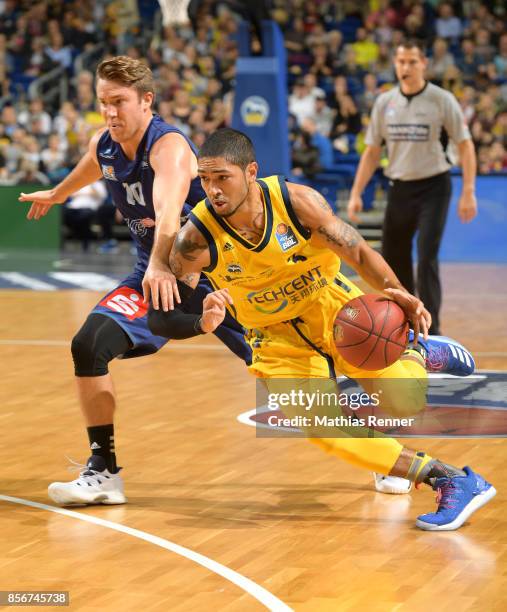 Jordan Hulls of the Eisbaeren Bremerhaven and Peyton Siva of Alba Berlin during the game between Alba Berlin and Eisbaeren Bremerhaven on October 2,...