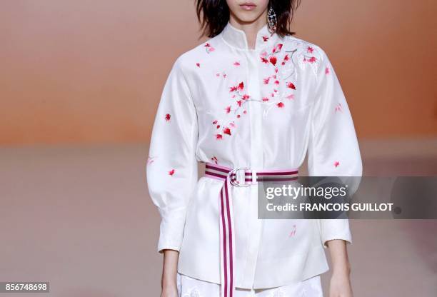 Model presents a creation by Shiatzy Chen, during the women's 2018 Spring/Summer ready-to-wear collection fashion show in Paris, on October 2, 2017.