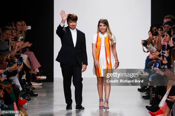 Designer Valentin Yudashkin and his daughter Galina walk the runway during the Valentin Yudashkin Paris show as part of Paris Fashion Week Womenswear...