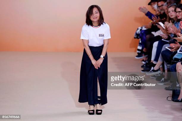 Taiwanese fashion designer Shiatzy Chen acknowledges the audience at the end of her women's 2018 Spring/Summer ready-to-wear collection fashion show...