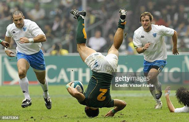 Robert Ebersohn of South Africa flipping over during their match against Uruguay on day two of the IRB Hong Kong Sevens at Hong Kong Stadium on March...
