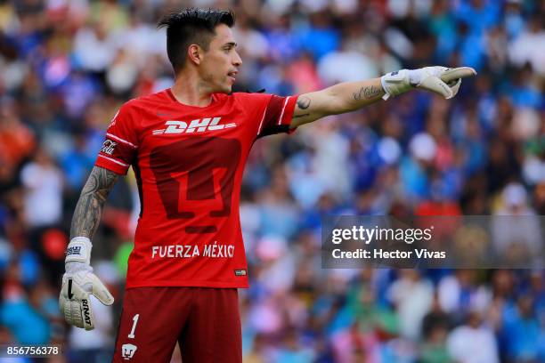 Alfredo Saldivar of Pumas signalds during the 12th round match between Pumas UNAM and Cruz Azul as part of the Torneo Apertura 2017 Liga MX at La...