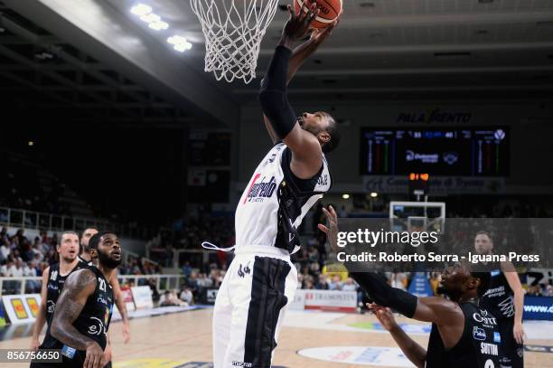 Marcus Slaughter of Segafredo competes with Chane Behanan and Dominique Sutton of Dolomiti Energia during the LBA LegaBasket match between Virtus...